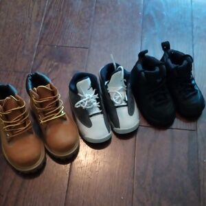Three pairs of baby shoes Nike/ Timberland boot